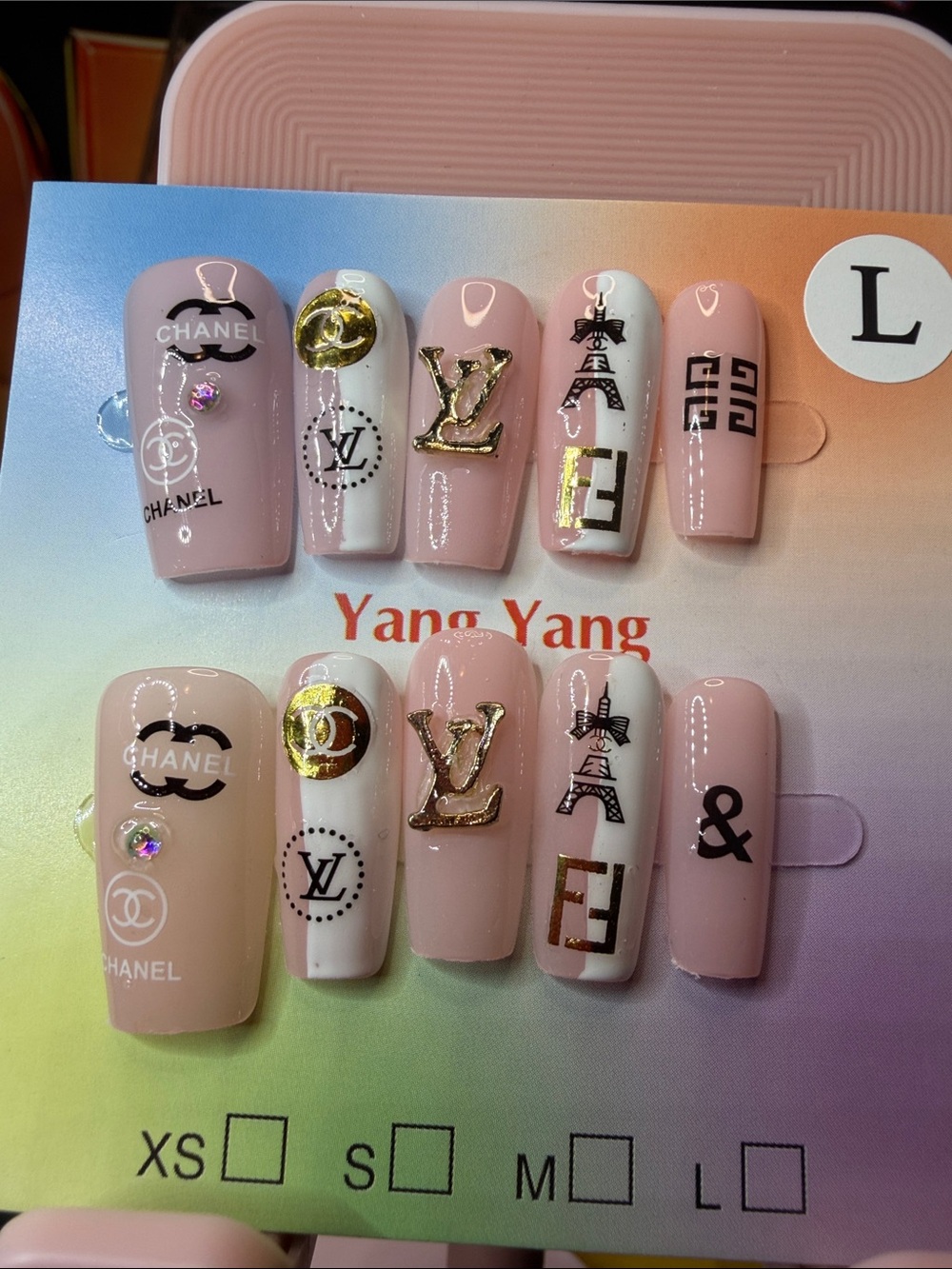 CHANEL Pink and White Logo Press-On Nail Set with Gold Accents